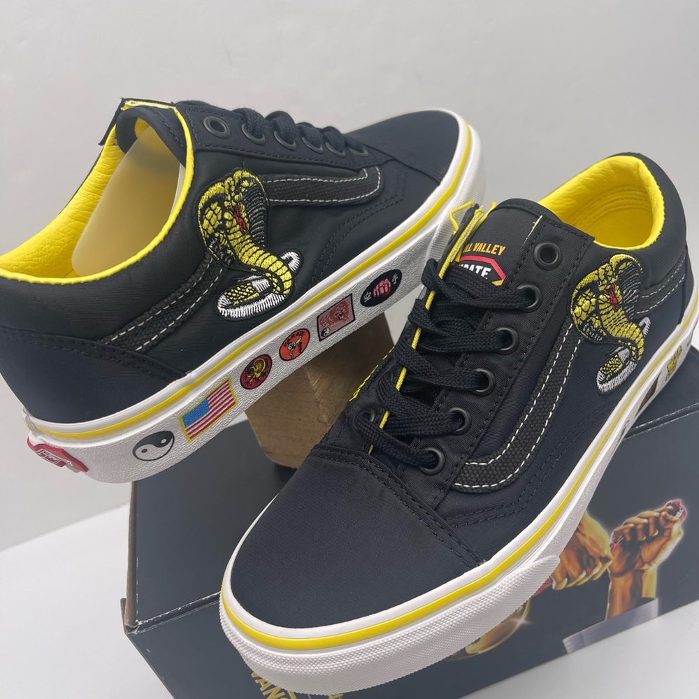 Vans Men’s Old Skool
Cobra Kai Black/Yellow/White Sneakers 
VN0A3WKT05N - Picture 5 of 16